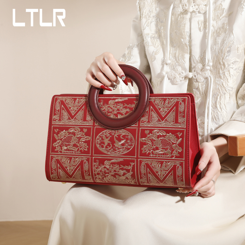 手提包2025新款红色婚包新中式刺绣旅游感百搭气质斜挎中年妈妈包